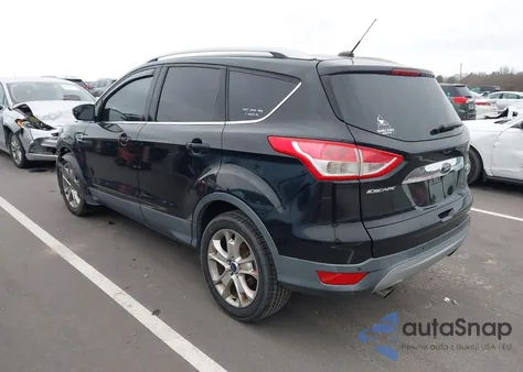 2016 Ford Escape Titanium z USA, uszkodzony, nr VIN 1FMCU0JX6GUB79270
